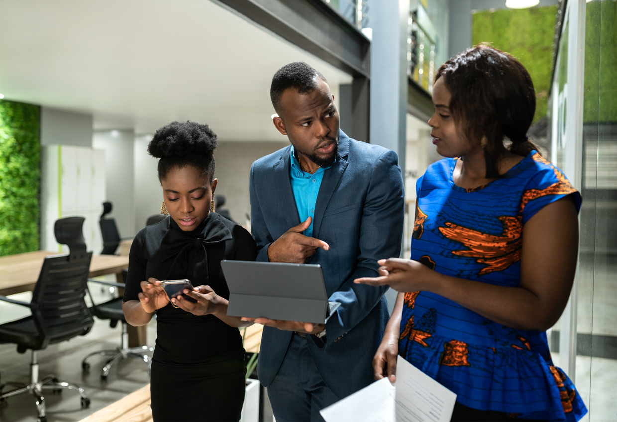 African professionals collaborating in a modern office